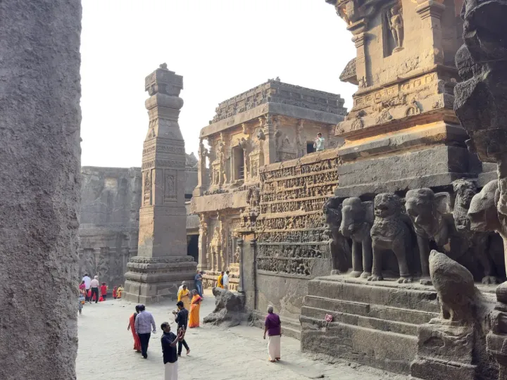 The Kailasa Temple at Ellora with its carved elephants and victory pillar